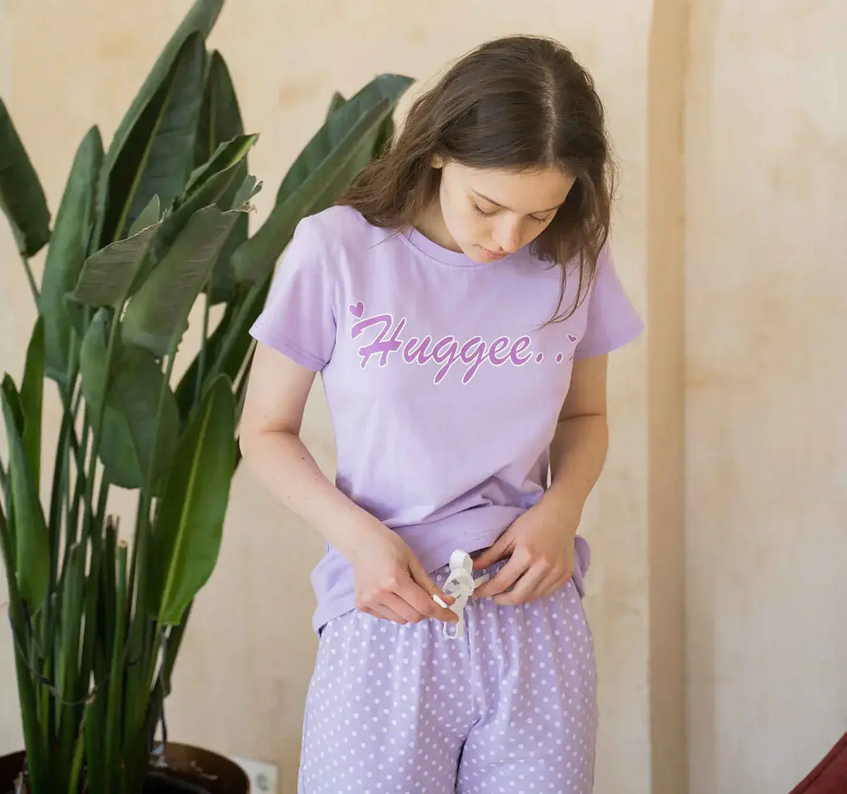 Breathable combed cotton pajama set in pastel purple with polka dots, showcasing comfort and style.