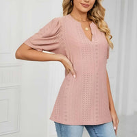 Lace trim puff sleeve blouse in soft pink, featuring a V-neck and elegant short sleeves.