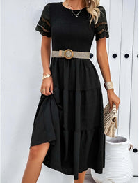 Hallow Eyelet Sleeve Dress featuring a shirred top, ruffle hem, and a chic black design.