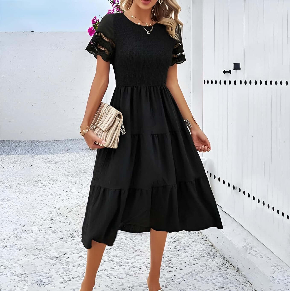 Hallow Eyelet Sleeve Dress - Women's boho fashion | Roll Up Fashion, featuring ruffle hems and eyelet sleeves in black.