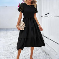 Hallow Eyelet Sleeve Dress - Women's boho fashion | Roll Up Fashion, featuring ruffle hems and eyelet sleeves in black.