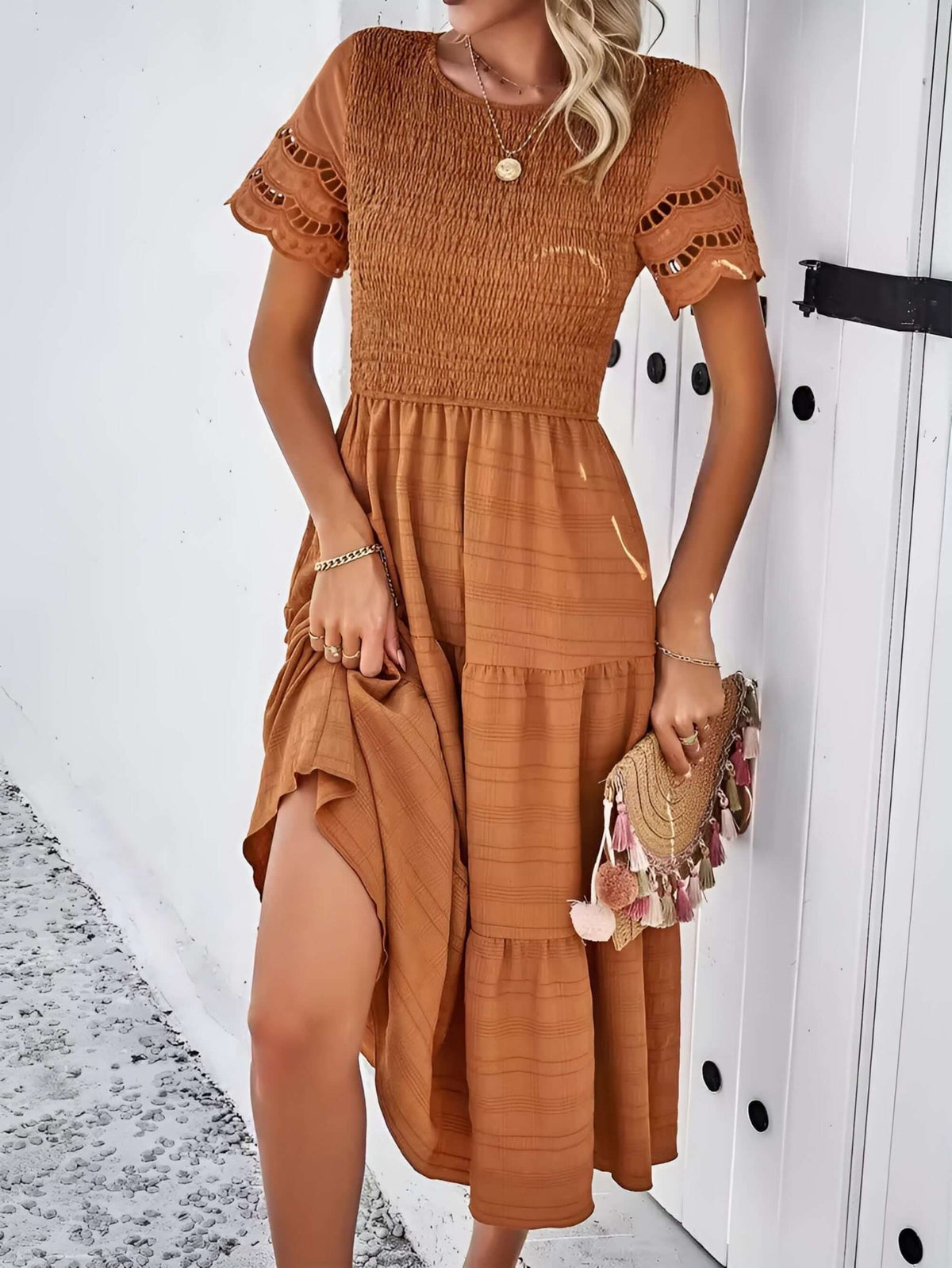 Hallow Eyelet Sleeve Dress with shirred top, ruffle hem, and eyelet sleeves in a chic solid color.
