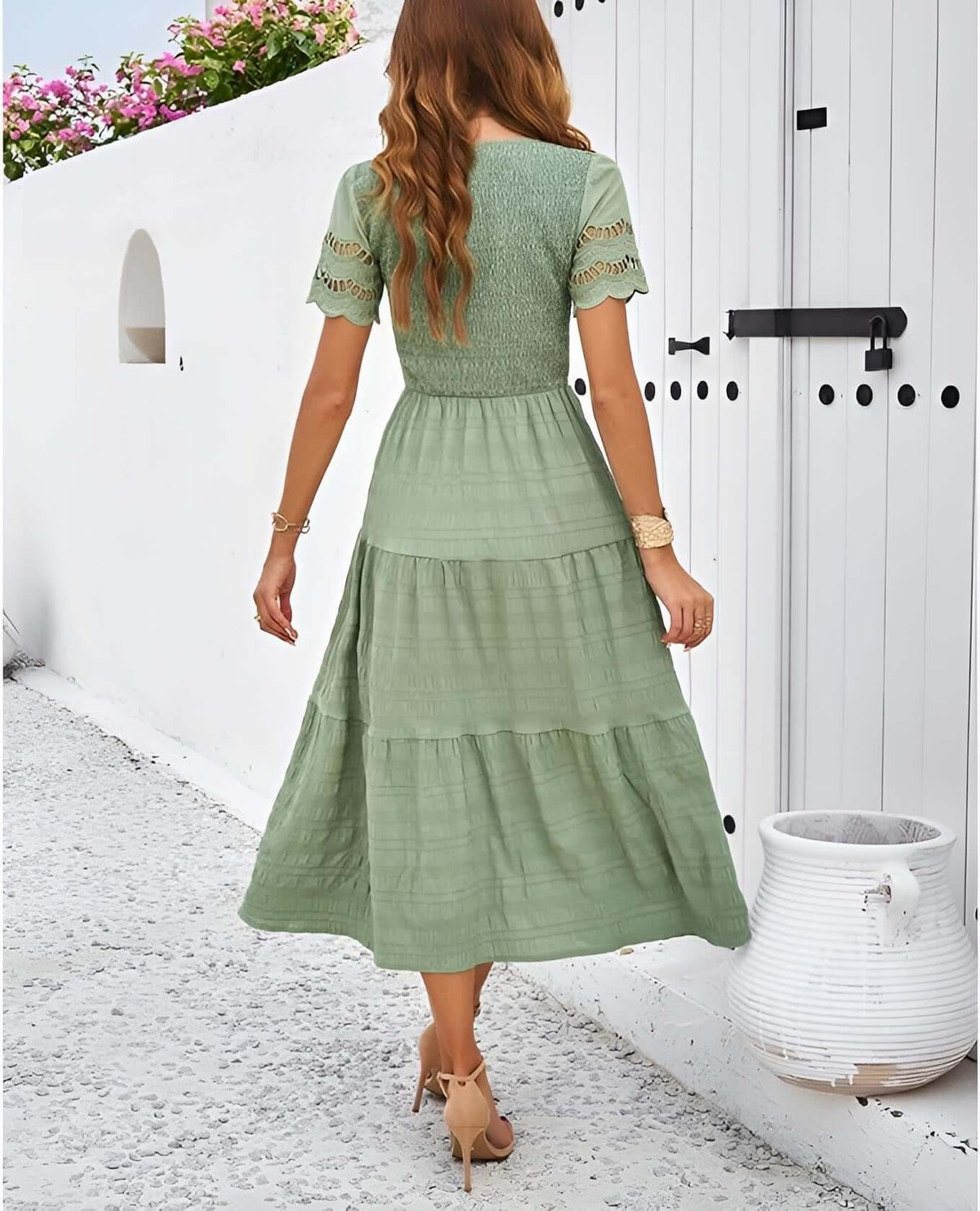 Hallow Eyelet Sleeve Dress - Women's boho fashion | Roll Up Fashion, featuring a model wearing a green tiered midi dress.