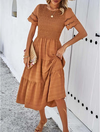 Hallow Eyelet Sleeve Dress - Women's boho fashion | Roll Up Fashion showcasing a chic brown tiered midi dress with eyelet sleeves.