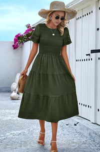 Hallow Eyelet Sleeve Dress showcased in green with ruffled hem, hollow eyelet sleeves, perfect for women's boho fashion.