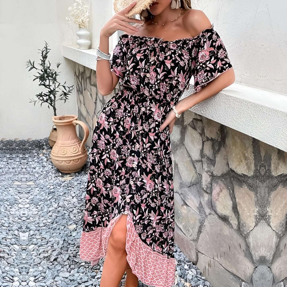 bohemian off shoulder maxi dress featuring vibrant floral patterns and an elegant off-shoulder neckline, perfect for summer events.