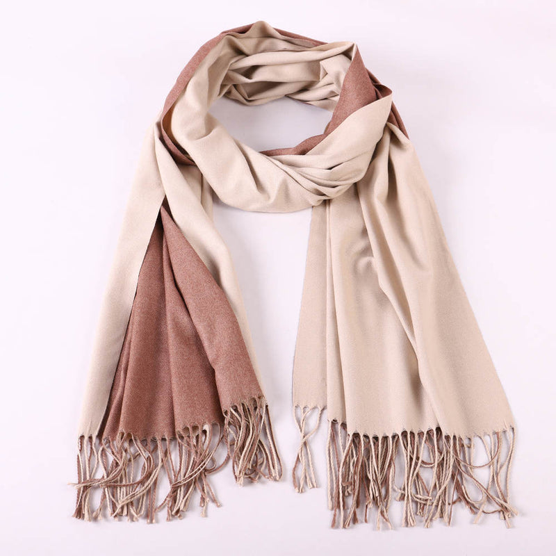 Two tone cashmere scarves in beige and brown color with fringed edges.